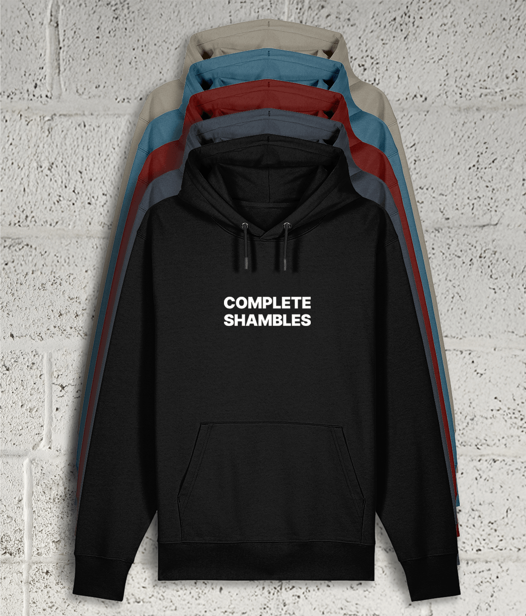 Front view of Shambles Studio COMPLETE SHAMBLES hoodie with graphic showing 5 colour variants