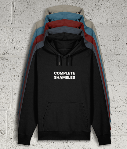 Front view of Shambles Studio COMPLETE SHAMBLES hoodie with graphic showing 5 colour variants