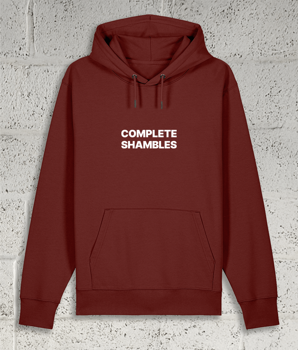 Front view of Shambles Studio COMPLETE SHAMBLES red hoodie with graphic