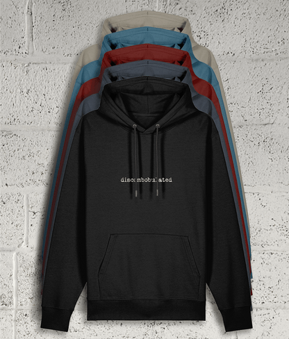 Front view of Shambles Studio Discombobulated hoodie with graphic showing colour variants