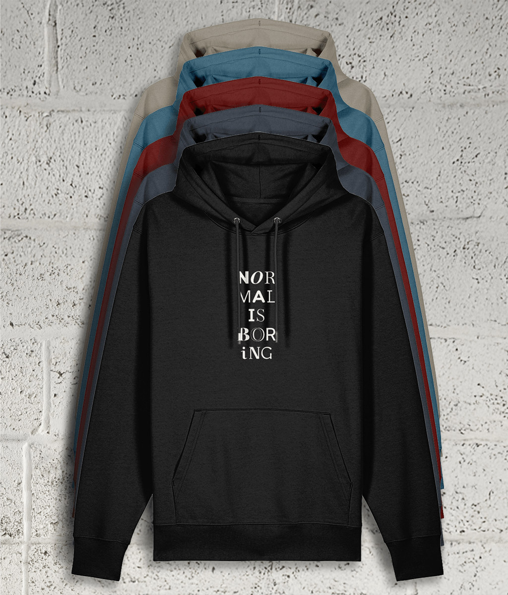 Front view of Shambles Studio NORMAL IS BORING hoodie with graphic showing 5 colour variants