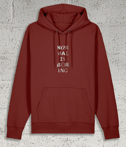 Front view of Shambles Studio NORMAL IS BORING red hoodie with graphic
