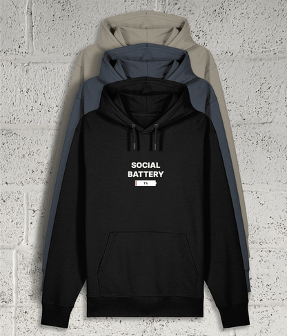 Front view of Shambles Studio SOCIAL BATTERY hoodie with graphic showing 3 colour variants