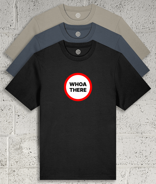 Front view of Shambles Studio “WHOA THERE” Tshirt with text in a white road-sign with a red border showing colour variants