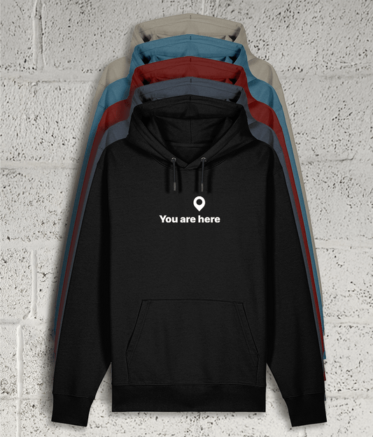 Front view of Shambles Studio You are here Hoodie with graphic showing 5 colour variants