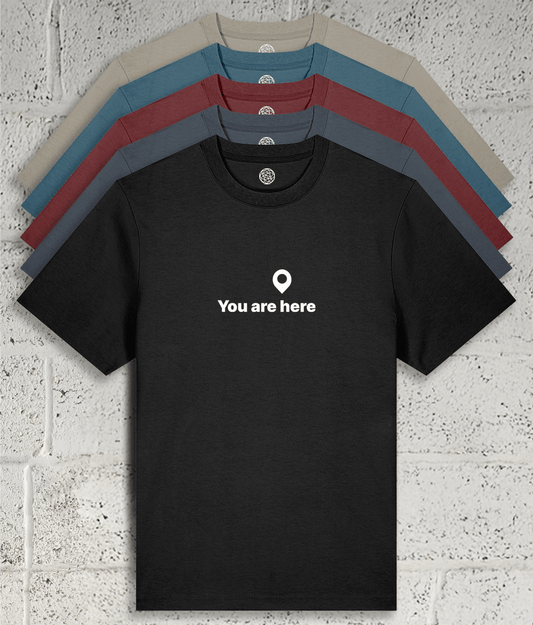 Front view of Shambles Studio You are here Tee with graphic showing 5 colour variants